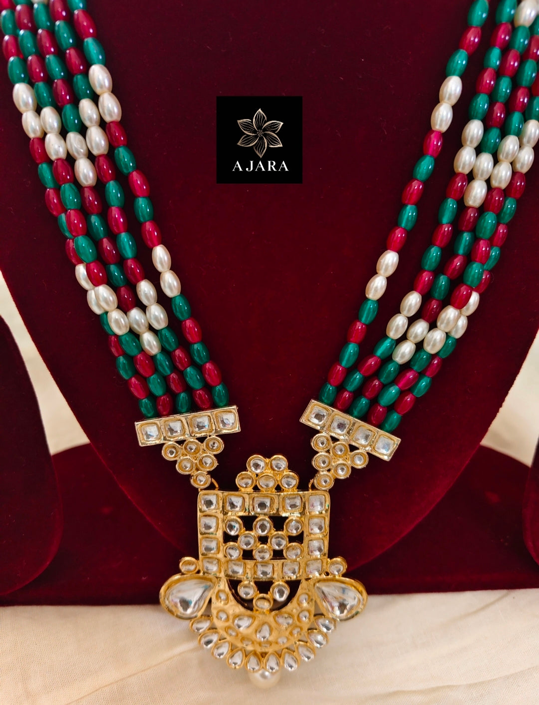 Rani and green kundan set