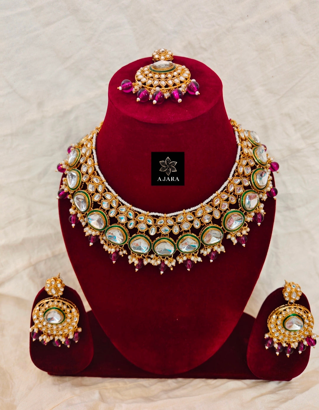 Purple colour pearl kundan set