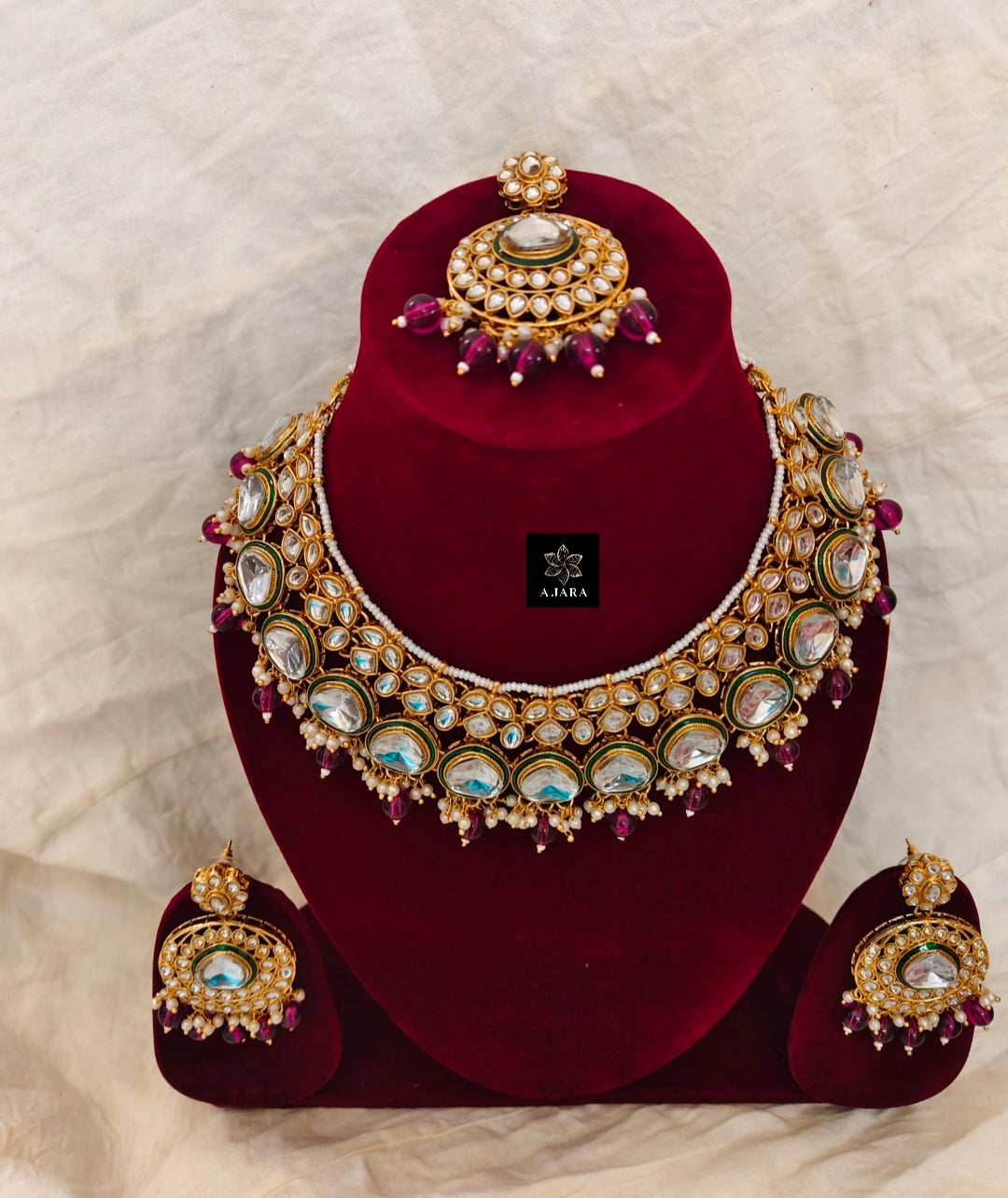 Purple colour pearl kundan set