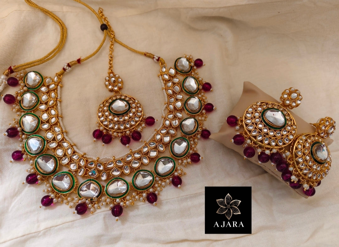 Purple colour pearl kundan set