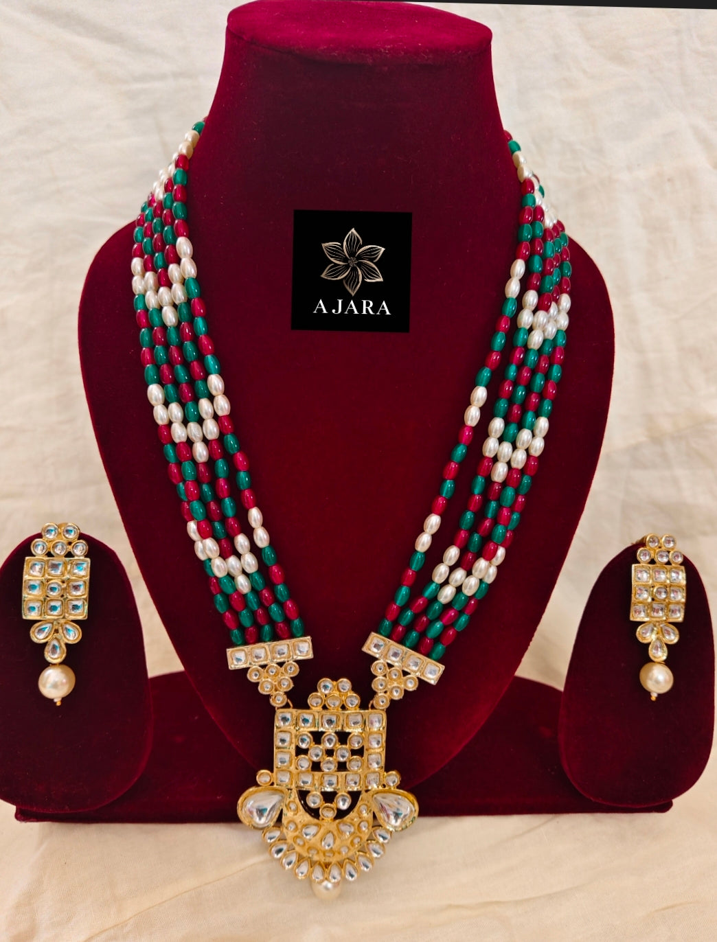 Rani and green kundan set