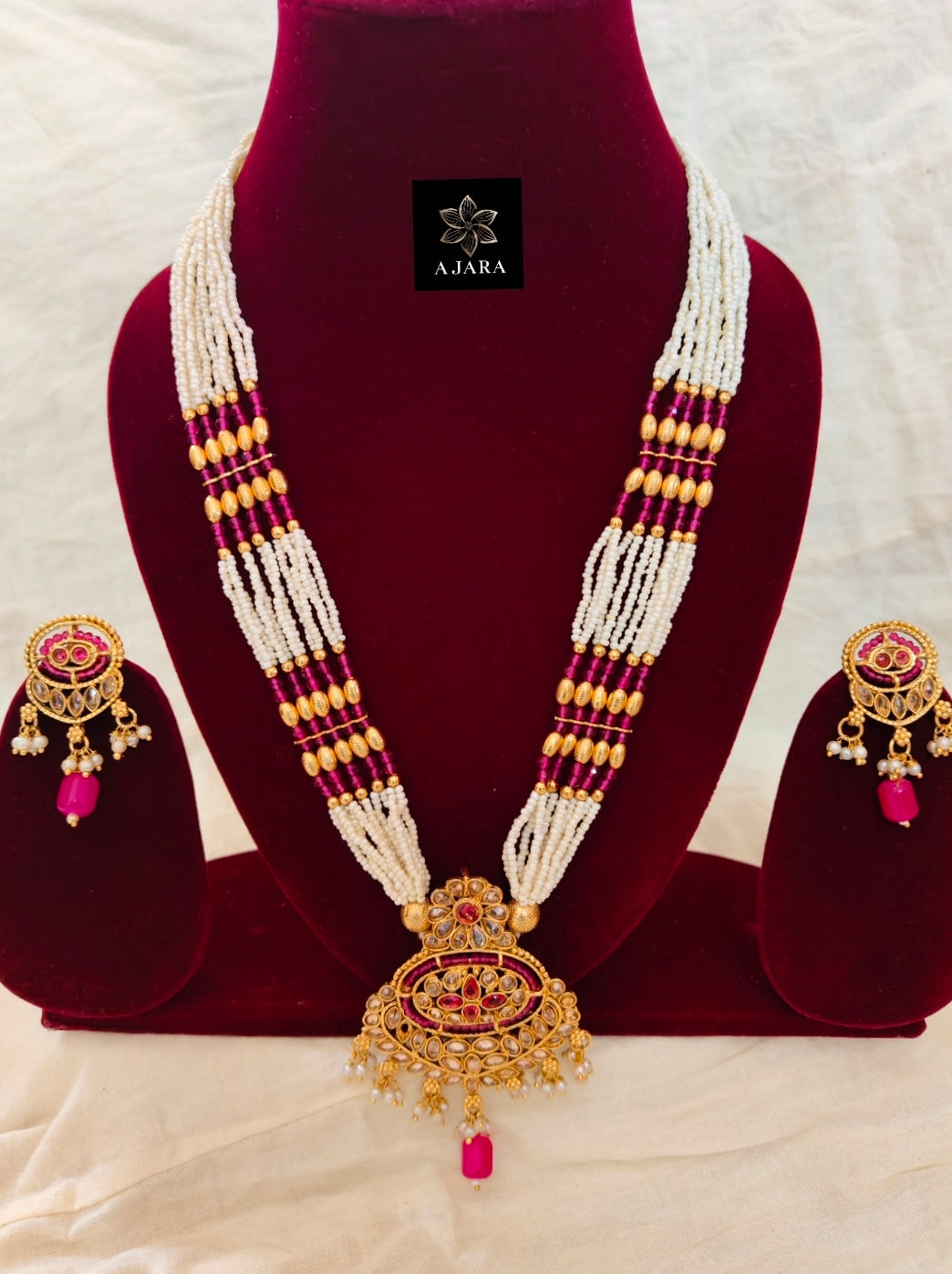 Rani White beads kundan long set