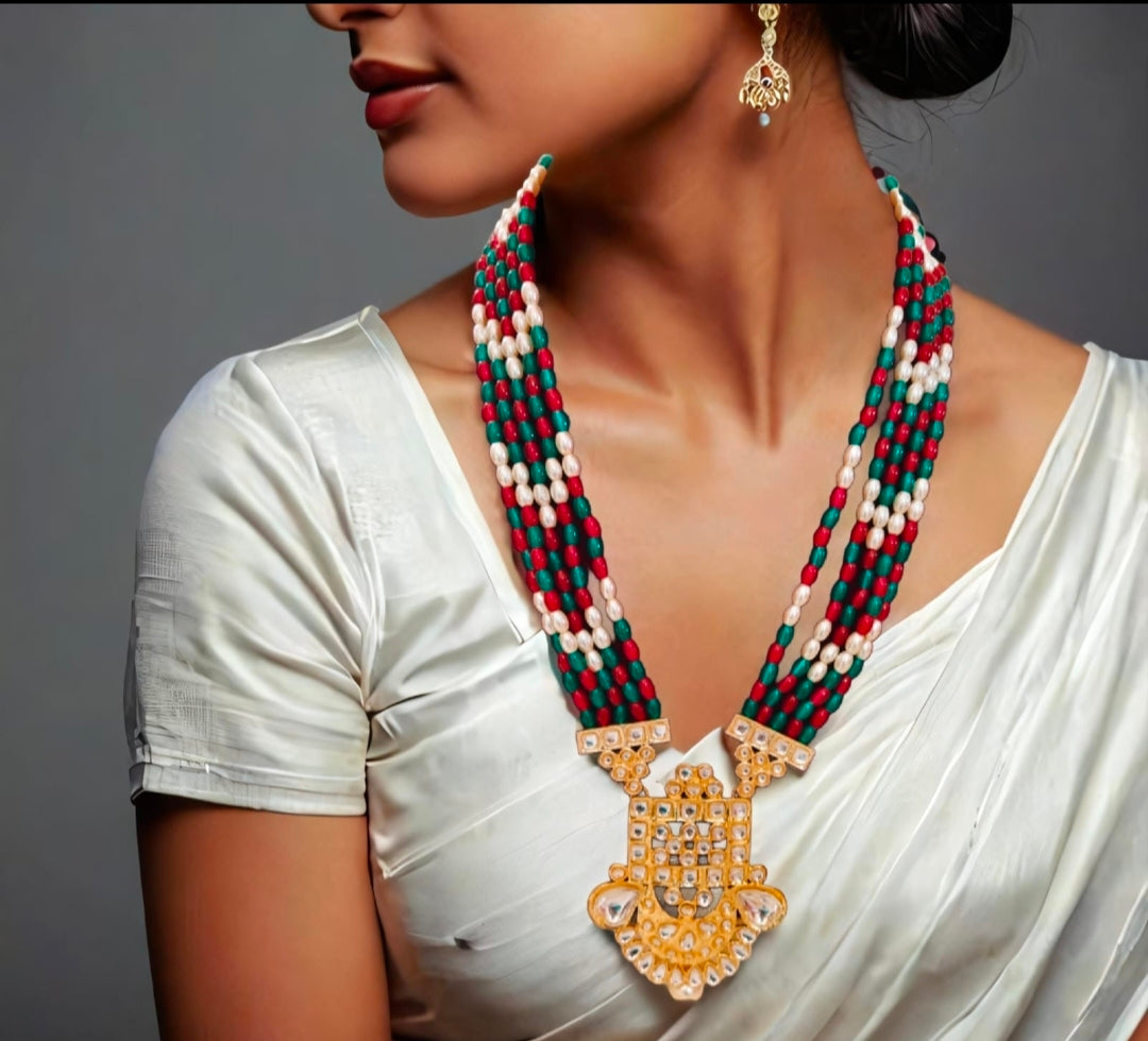 Rani and green kundan set